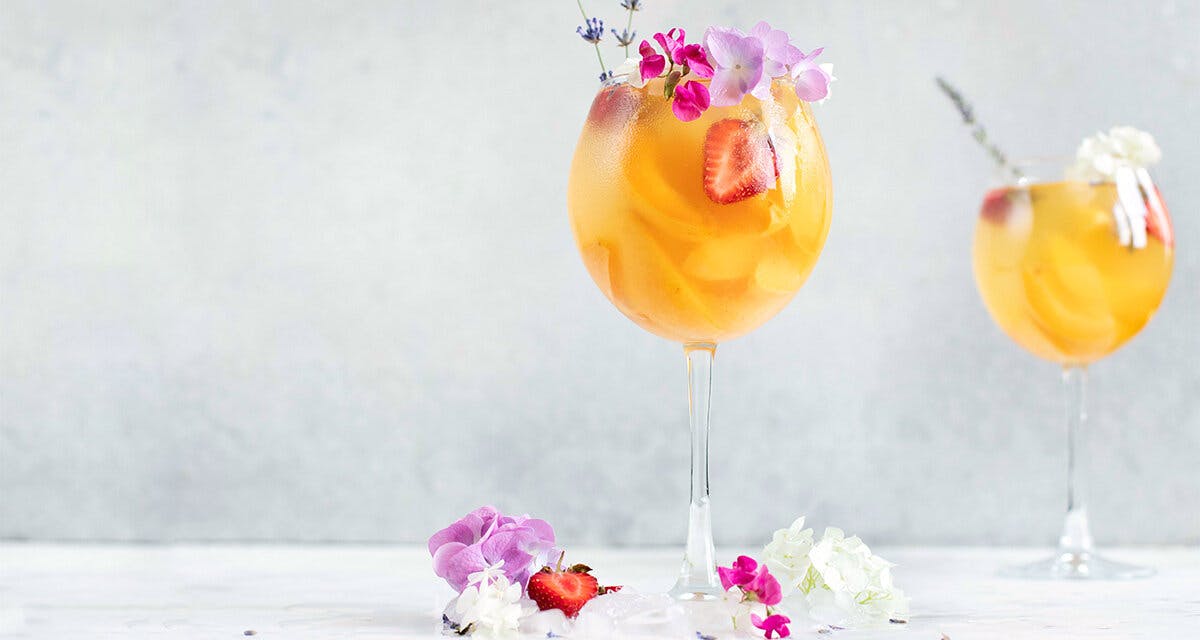 This Peach & Apricot Gin Fizz tastes as beautiful as it looks!