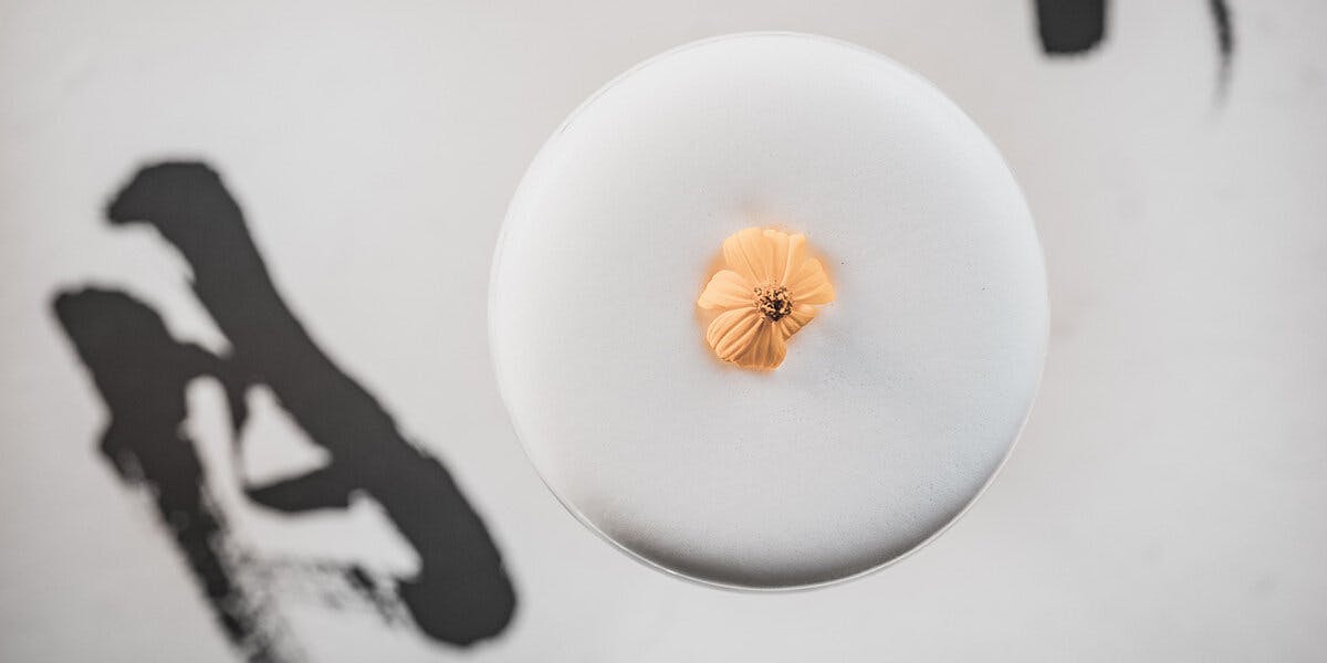 Orange liqueur and gin come together in this delicate cocktail for a perfect Spring sip!