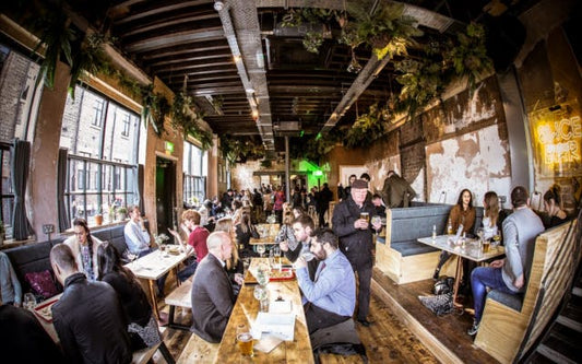 6 places serving pizza with a side of G&Ts