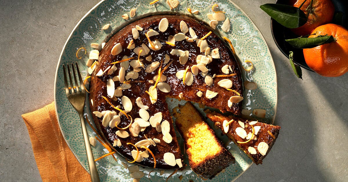 Orange almond cake with marmalade gin glaze and lemon curd mascarpone is a beautiful slice of sunshine